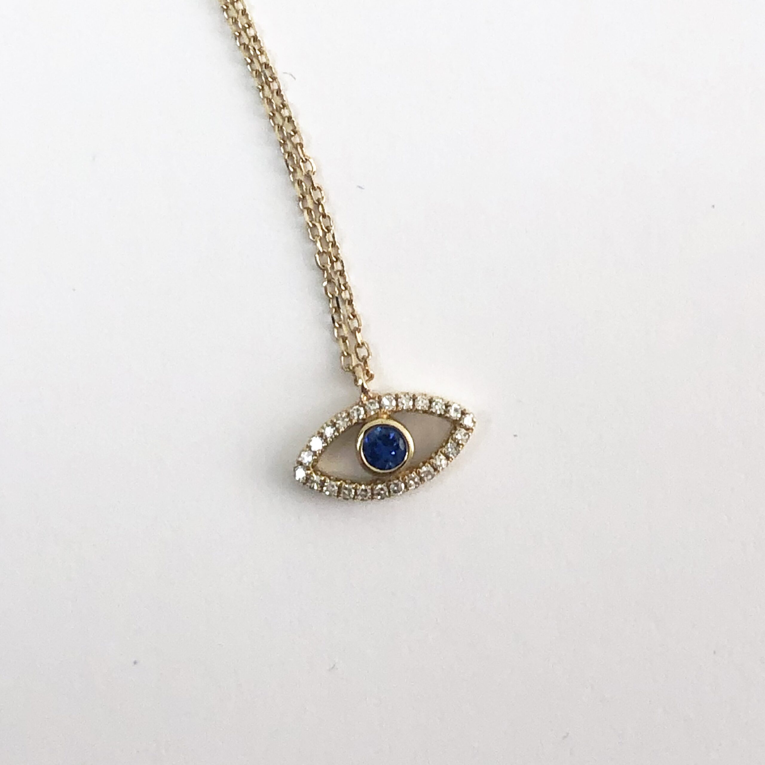 Blue Sapphire Eye Pendant – Diamonds On The Key